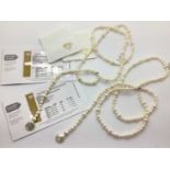 The Genuine Gemstone Company Ltd; A Silver Clasped White Freshwater Pearl Long Necklace, the