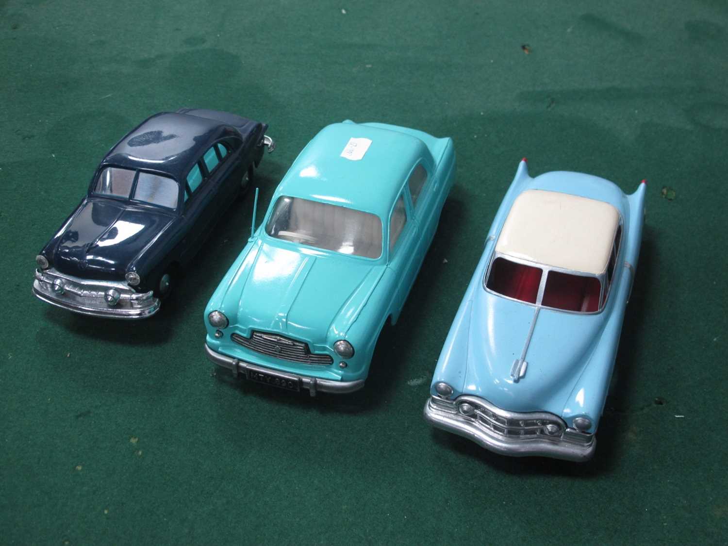 Three Mid XX Century Large Scale Plastic Cars, by Mettoy and others, sometimes repainted.