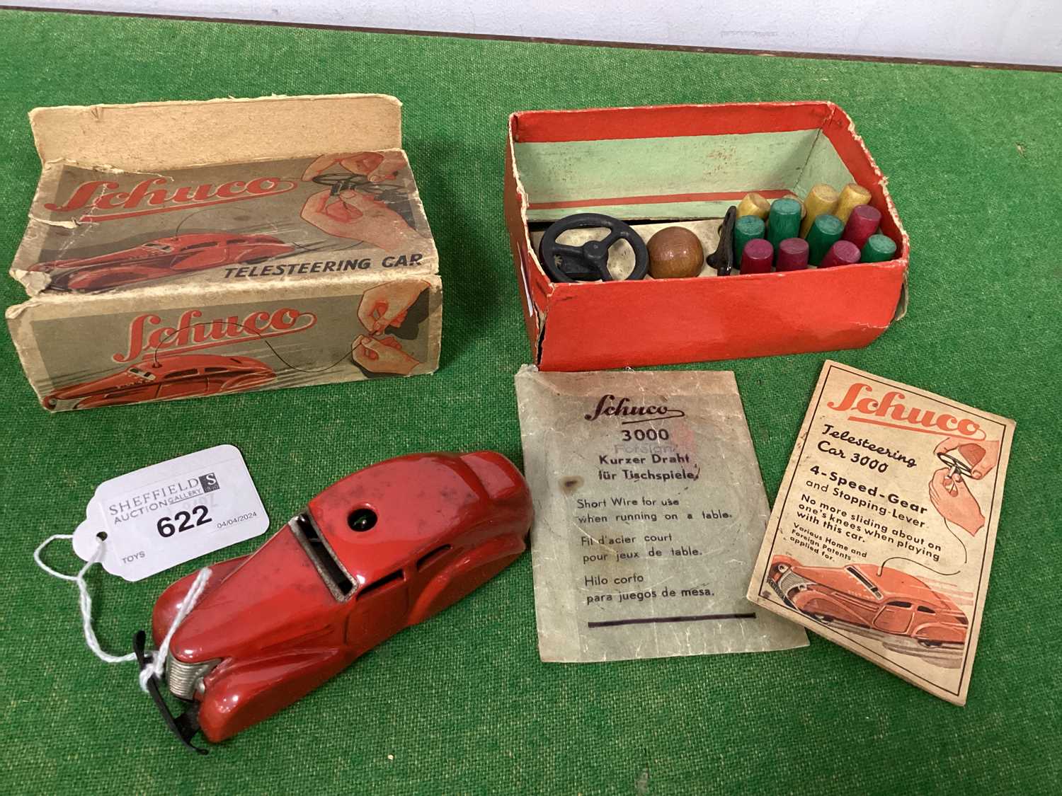 A boxed Schuco Telesteering Car 3000, appears complete with 12 wooden posts, key, ball, steering