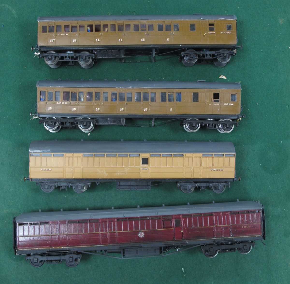 Four 'O' Gauge/7mm Kit Built Bogie Coaches, comprising a BR maroon parcels, R/No. E15132 - A L.N.E.R