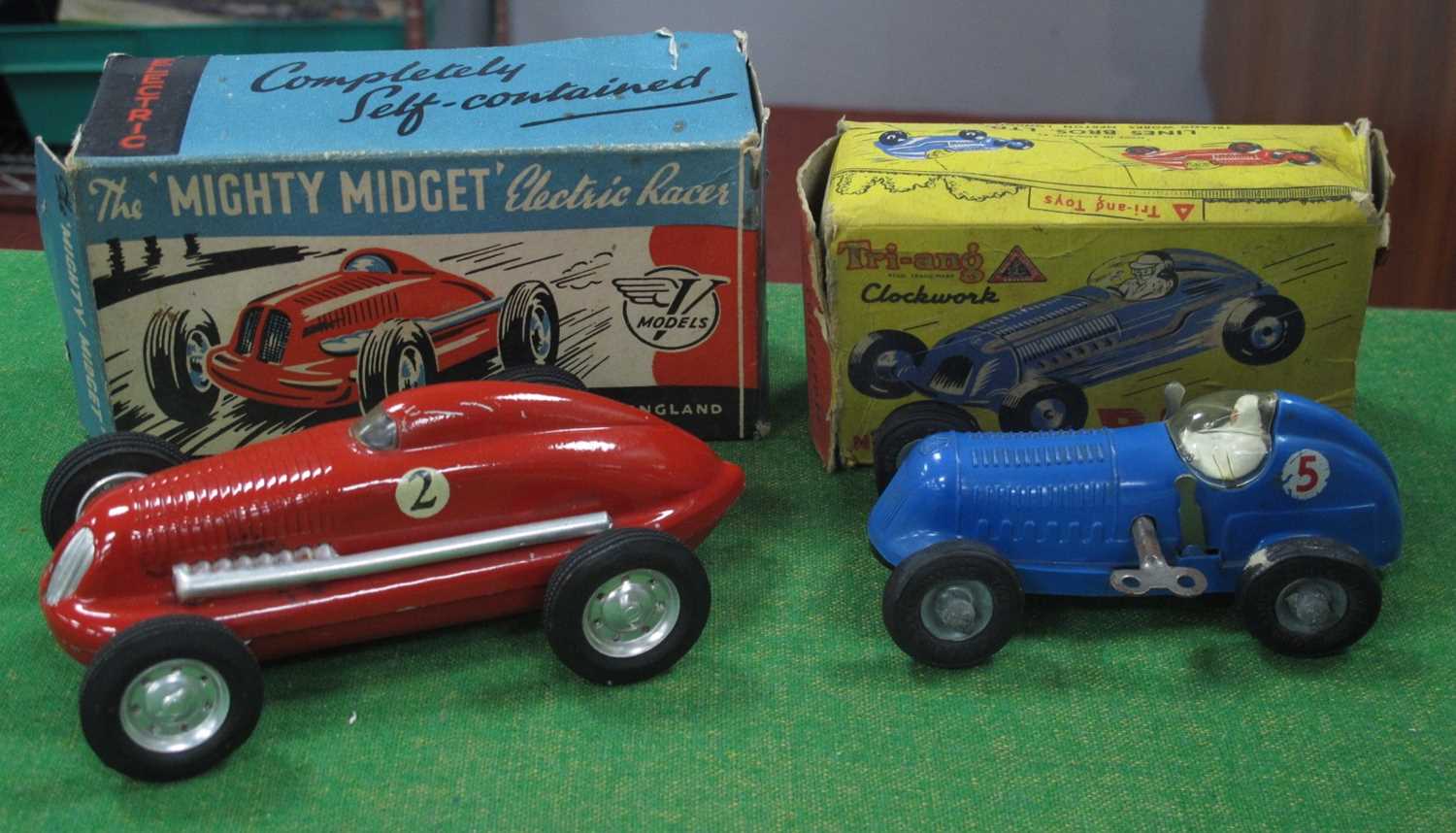 A Victory Industries "Mighty Midget Electric Racer, red, boxed with paperwork. Plus a Tri-ang