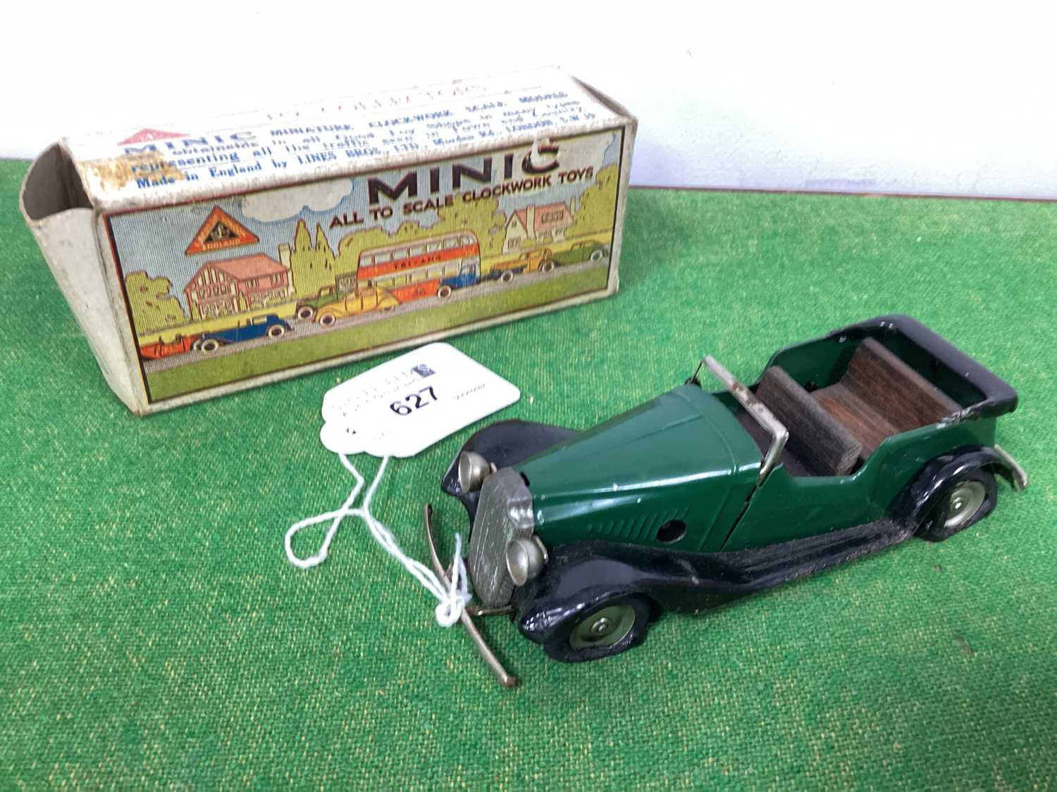 A Post War Tinplate Clockwork Minic Vauxhall Cabriolet, green/black, overall good, boxed, one