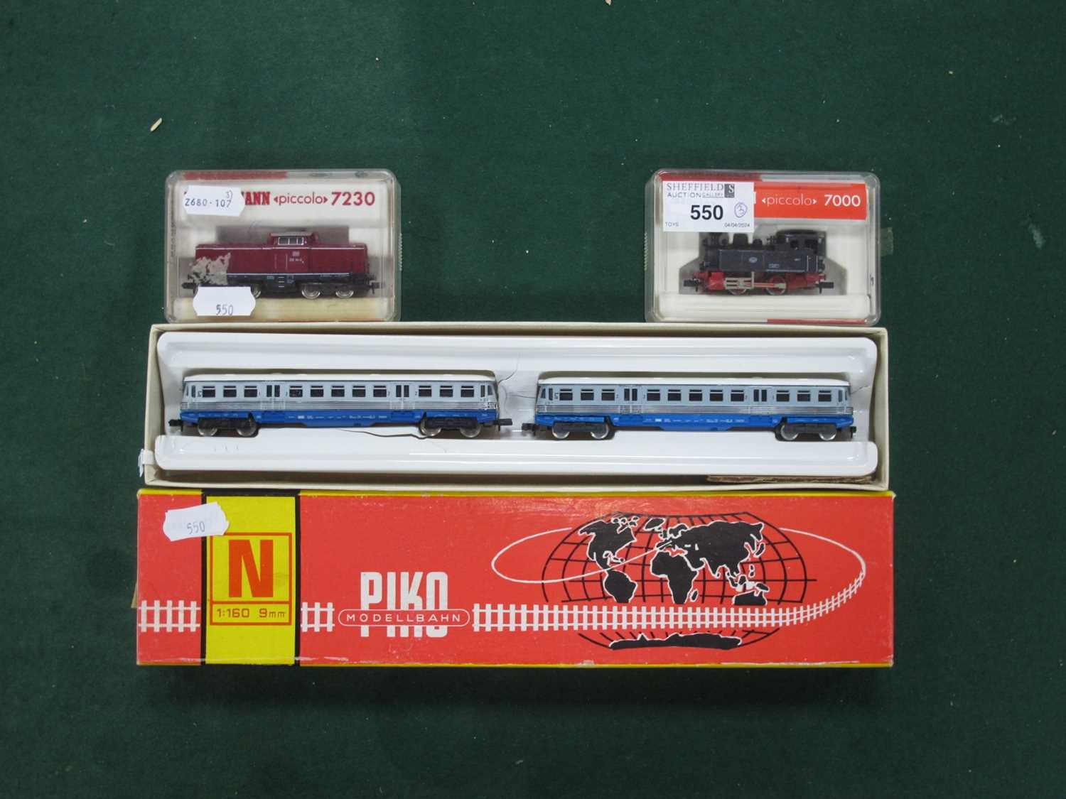A Piko 'N' Gauge Ref No. 5/0649 Two Unit Class VT4-12 Diesel Railcar and Trailer, of the DB Railway.