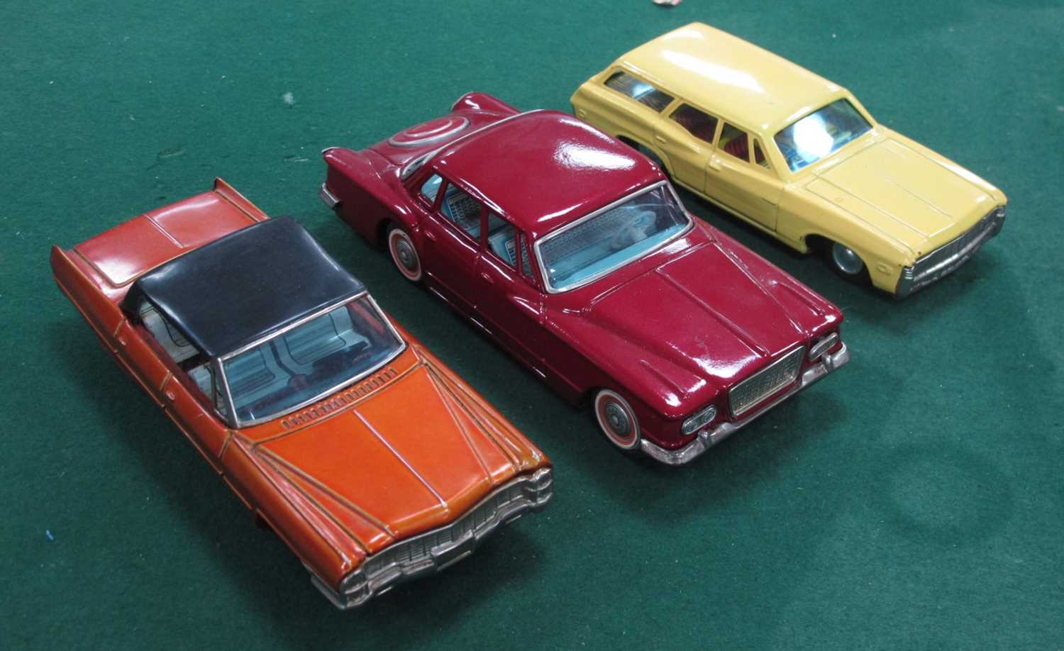 Three Original Tinplate 'Push 'N' Go Cars, by Bandai of Japan, a Chevrolet Estate, a Chrysler