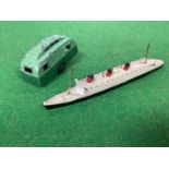 A Pre-War Dinky Caravan, two tone green, missing tow hook, playworn. Plus a Dinky Queen Mary, with