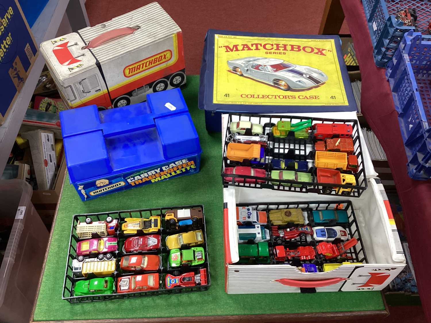 Four Matchbox Collector's Carry Cases together with Thirty Five Matchbox 1-75 series and similar