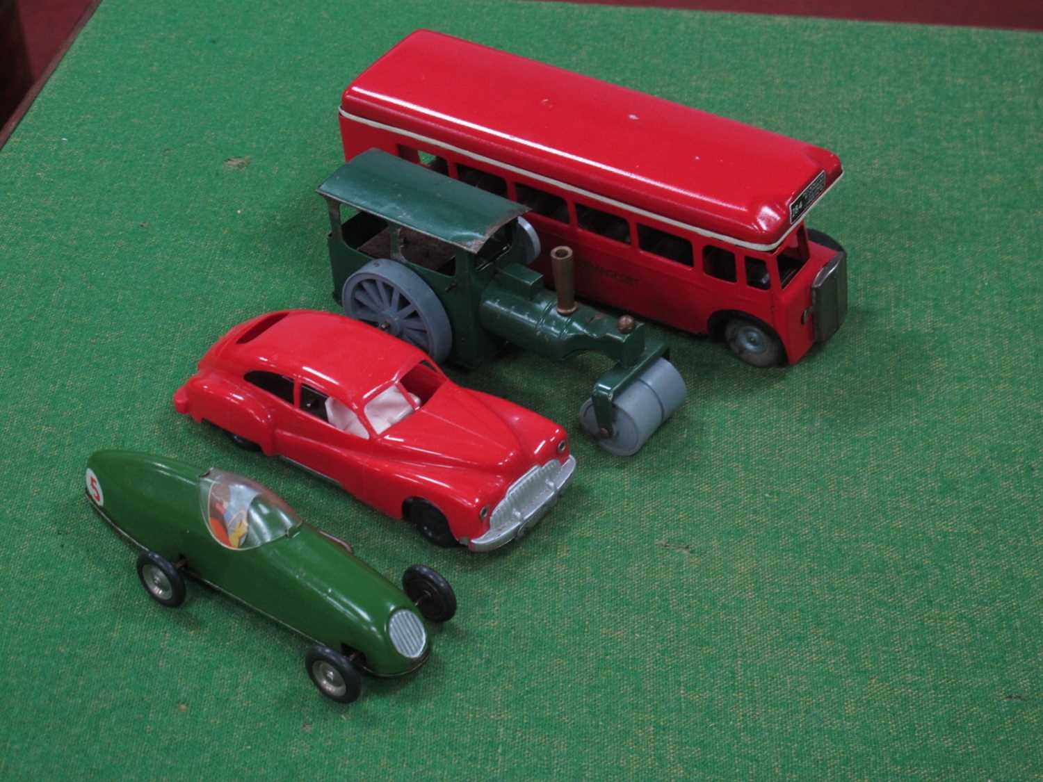 Four Mid XX Century Minic Toys, all clockwork, including a single Decker London Transport Bus,