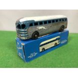 An Early Ertl & Co Model of a Greyhound Bus, boxed, signs of wear.
