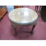 Mid XX Century Walnut Coffee Table of Circular Form, with carved border and knees to cabriole legs