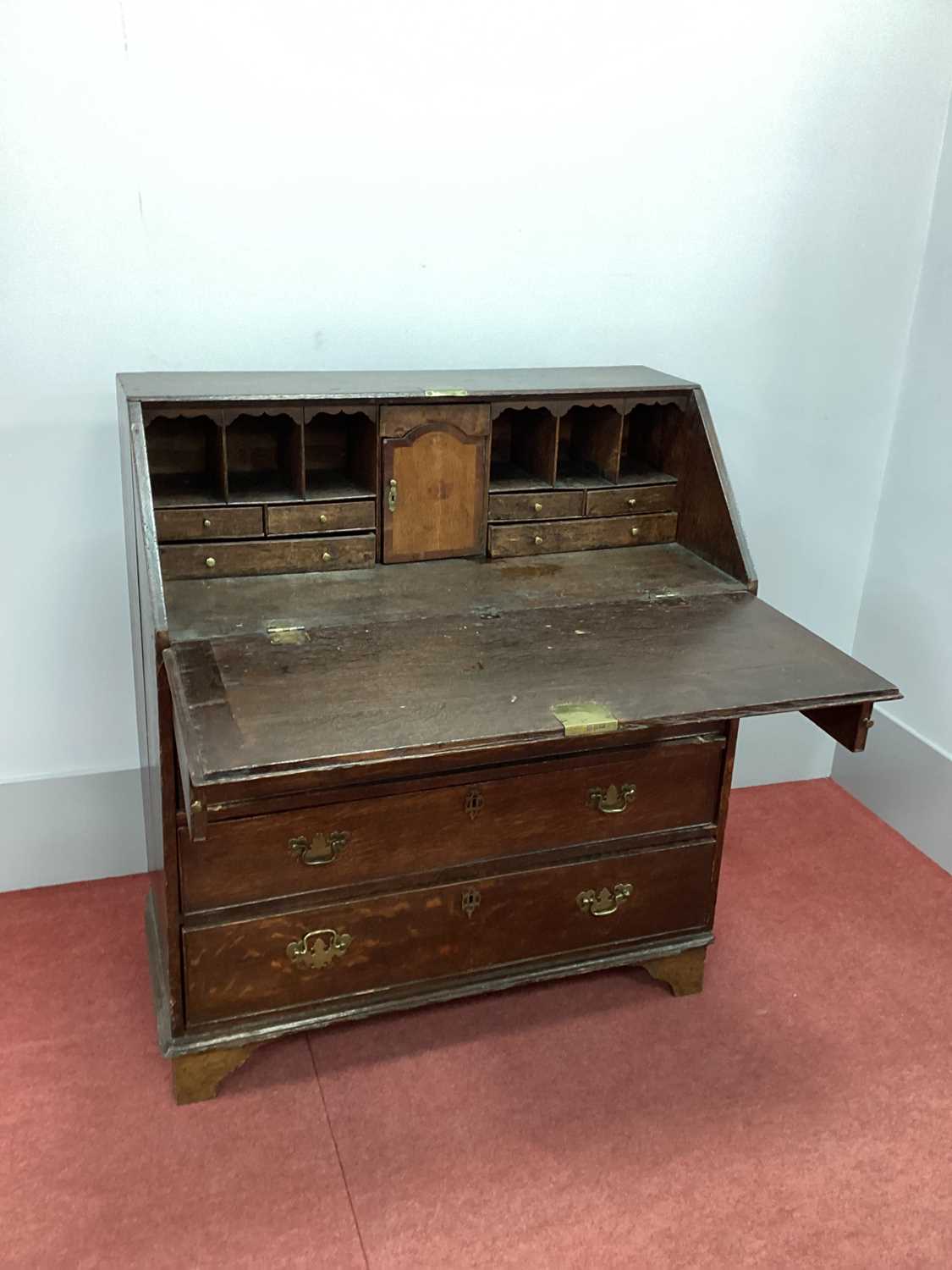 An XVIII Century Oak Bureau, with fall front and fitted interior above four long drawers, on bracket - Image 2 of 3