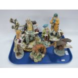 Capodimonte Tramp on Bench Figure Group, Young Hunter, Kowa Fox, Eagle and two foreign figurines (