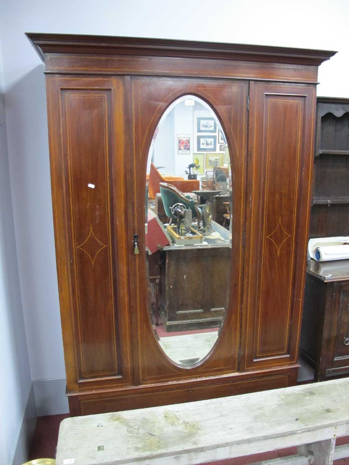 An Edwardian mahogany inlaid wardrobe with single mirrored door over long drawer, on a plinth - Image 3 of 4