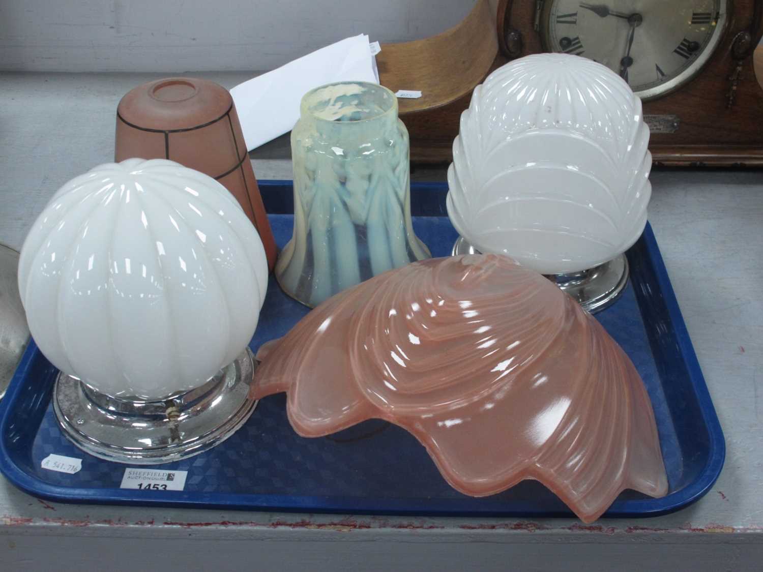 An Art Deco Pink Glass Shell Shaped Shade, a Victorian milk glass shade, two Art Deco lamps on