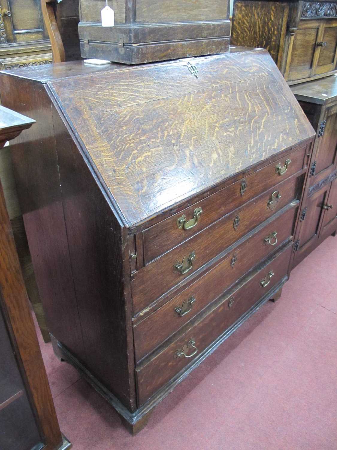 An XVIII Century Oak Bureau, with fall front and fitted interior above four long drawers, on bracket - Image 3 of 3