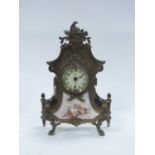 Continental Brass Cased Mantle Clock, with eagle finial, paw feet, lower porcelain panel featuring