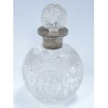 Cut Glass Globular Scent Bottle with Silver Neck, complete with stopper, 17cm high overall.