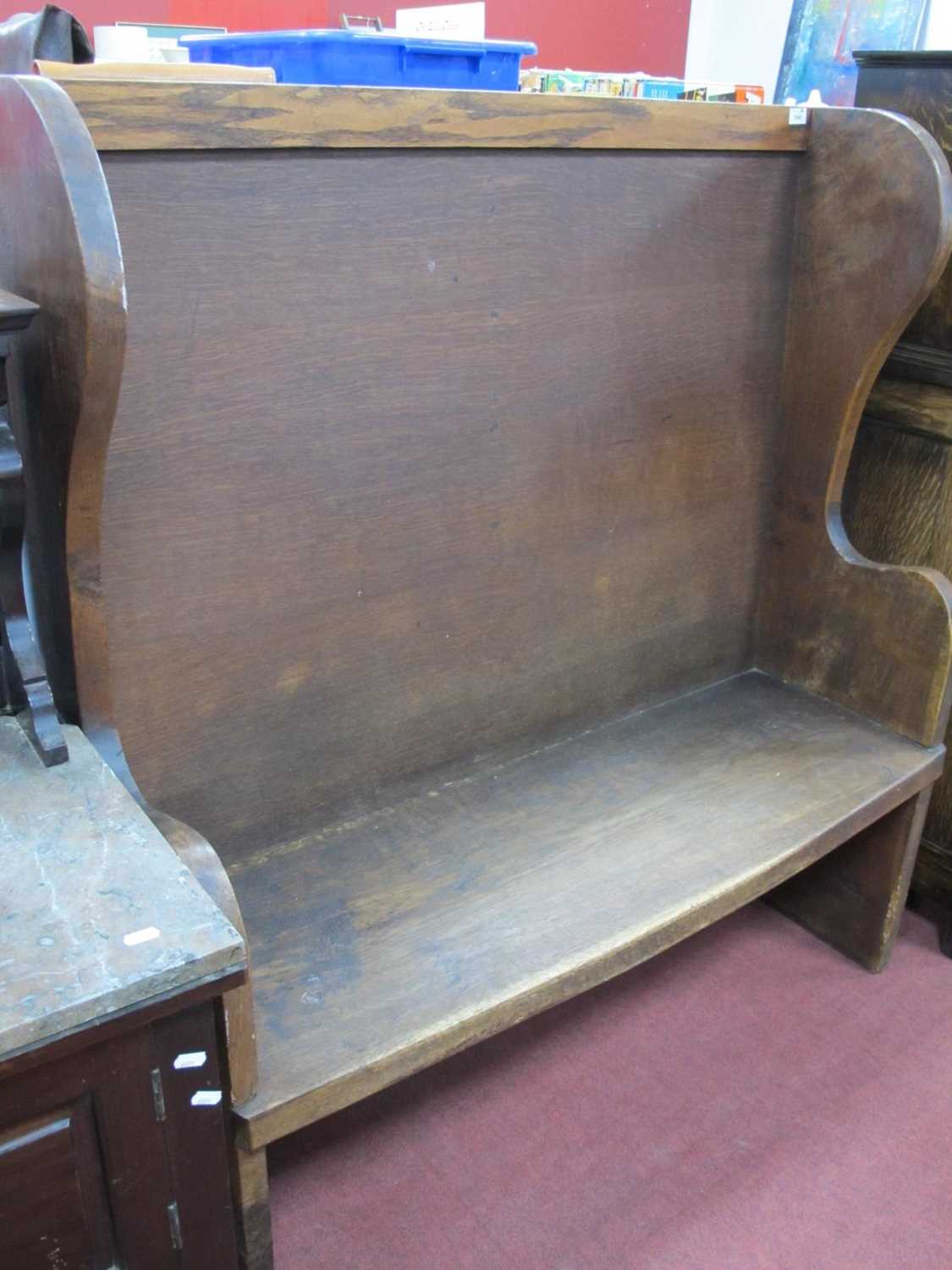 XX Century Oak Settle, with shaped sides (woodworm), 121cm wide. Approximately 132cm high