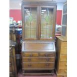 1930s Oak Bureau Bookcase, the top with glazed leaded astragal doors, fall front, fitted interior,