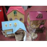 Epoch & Co. Sylvanian Families House, figures and furniture, together with two further houses.