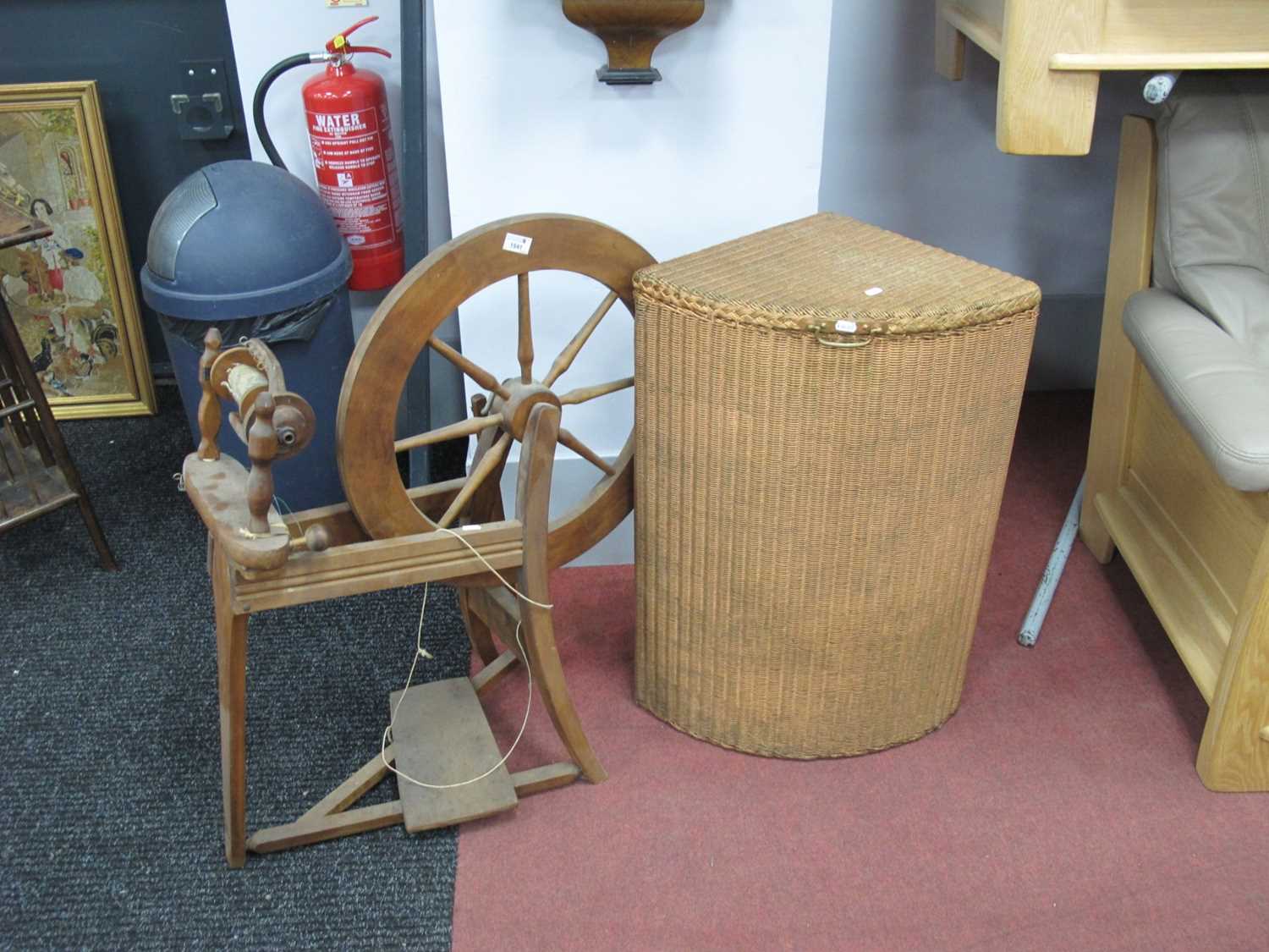 XX Century Spinning Wheel, together with a corner laundry basket. (2)