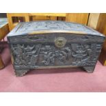 XX Century Oriental Carved Camphor Wood Box, with a slightly domed top, profusely carved to the top,