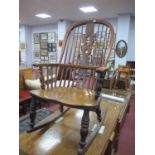 XIX Century Ash & Elm Rocking Chair, with pierced central splat and spindle back, turned legs,