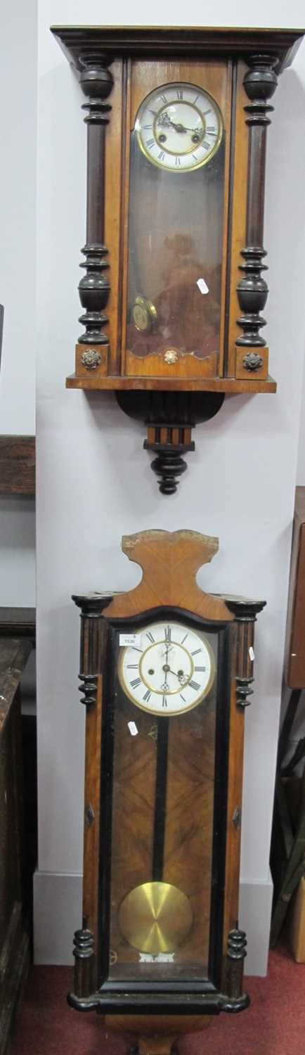 Two XIX Century Walnut Viennese Cased Wall Clocks, each with eight-day movement (2).