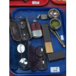 Four Pairs of Spectacles, brass compass, vesta case, hip flask, pair of plated salts:- One Tray.