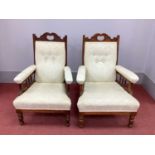 A Pair of Stained Mahogany Armchairs, with shaped and carved top rail, upholstered back, seat and