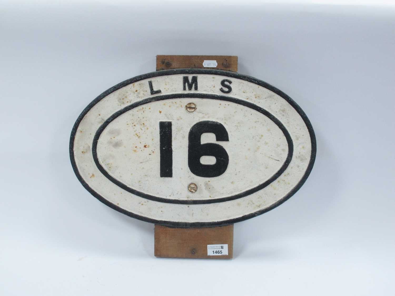 LMS 16, cast iron oval plaque, possibly for bridge, 29cm high, 45cm wide.