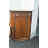 XIX Century Flat Fronted Corner Cupboard, with a mahogany cross banded panelled door, 102cm high.