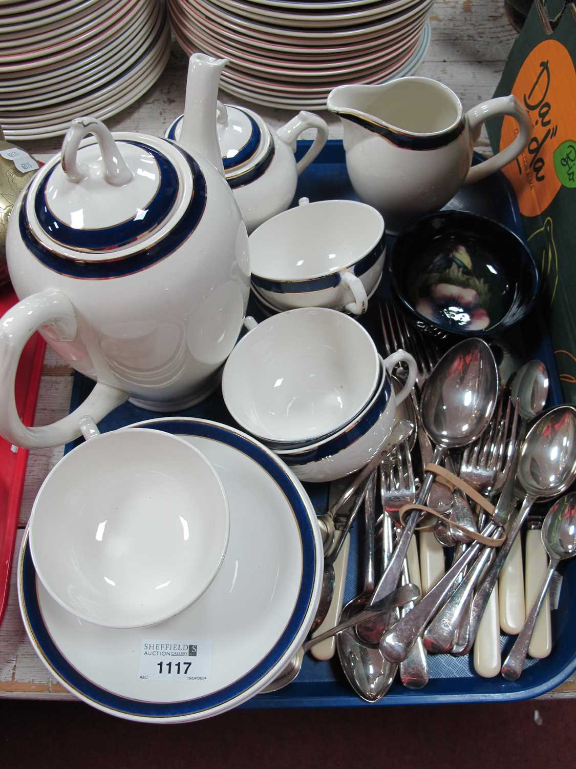 Moorcroft Pottery Bowl, 11cm diameter (damaged) Boch coffee ware of eighteen pieces, cutlery, etc.