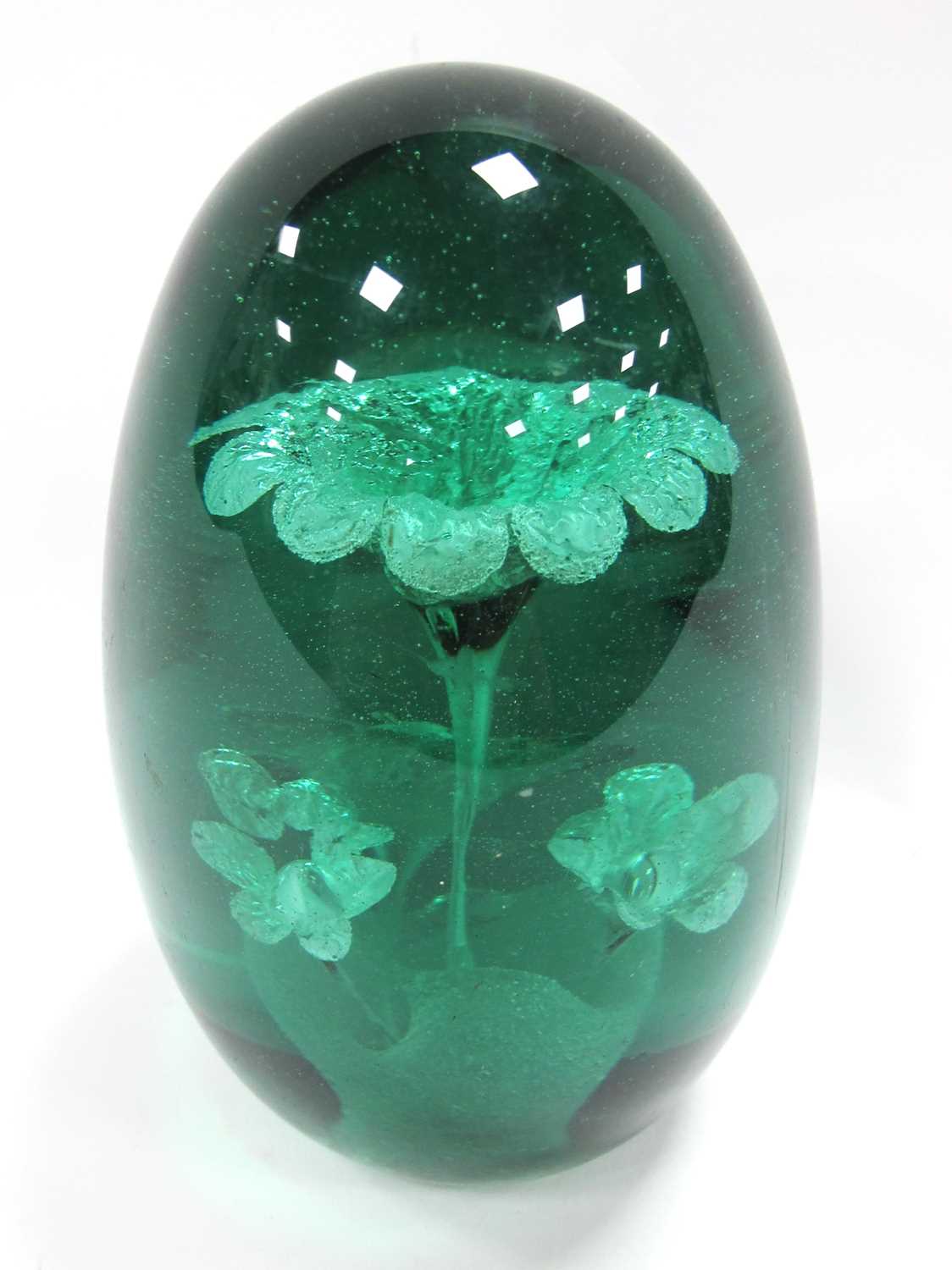 XIX Century Green Glass Dump, ovoid form with vase of flowers inner design 13.5cm high