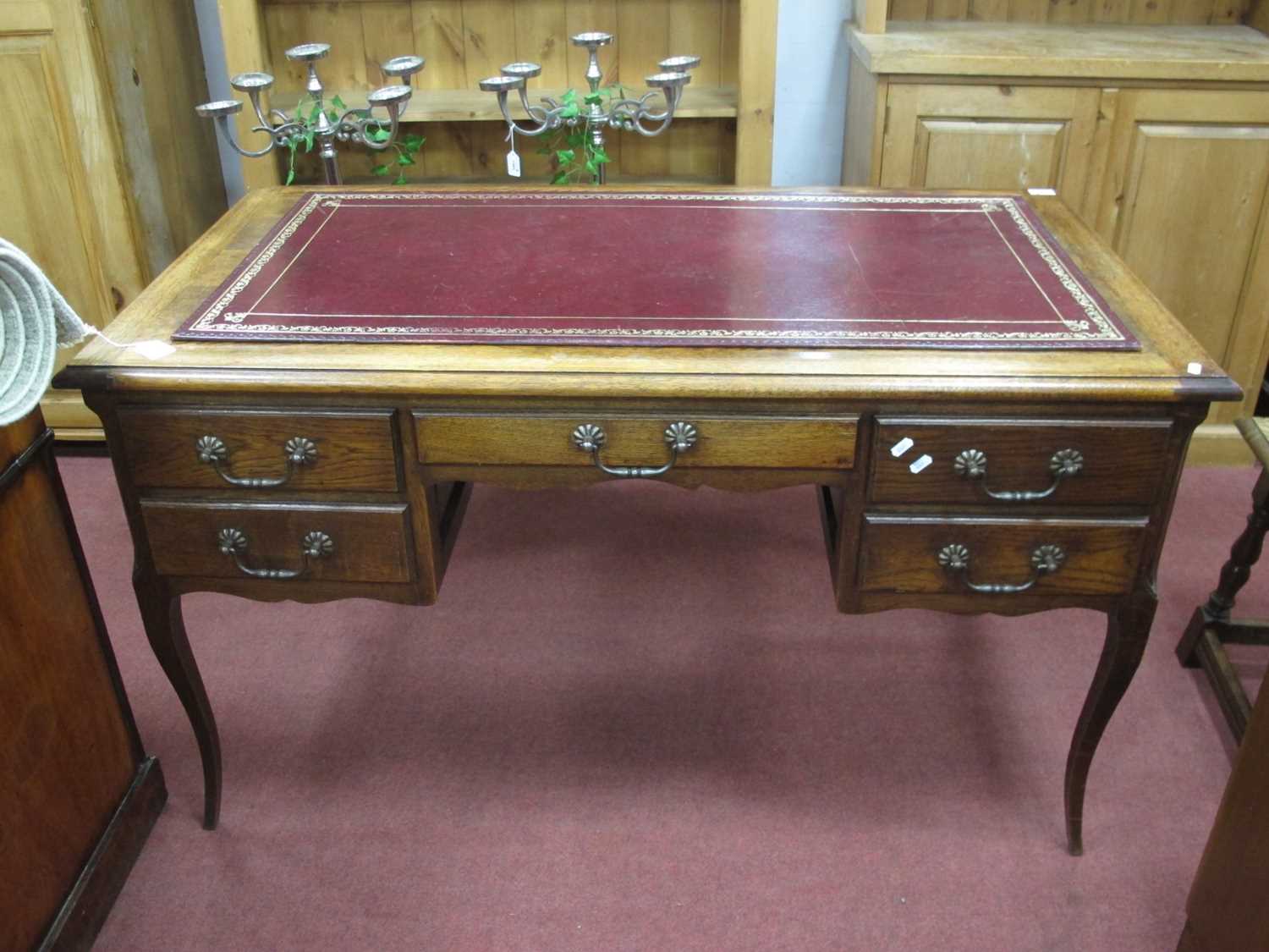 XX Century Oak French Style Desk, the top with moulded edge over central drawer and flanking drawers