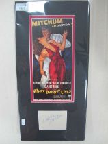Robert Mitchum Autograph, blue pen signed (unverified) on white paper, with image, as an unframed