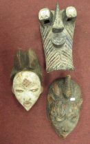 Three Painted African Masks.