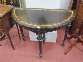 XIX Century Ebonised Demi-Lune Card Table, with a foldover crossbanded top, baized interior, on