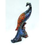 Anita Harris Model of a Peacock, in reactive glazes and lustre enamels, gold signed, 27cm high.