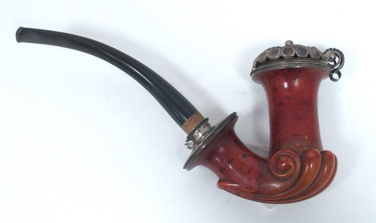A German XIX Century Meerschaum Pipe, with carved scrolling and white metal mounts, makers mark '
