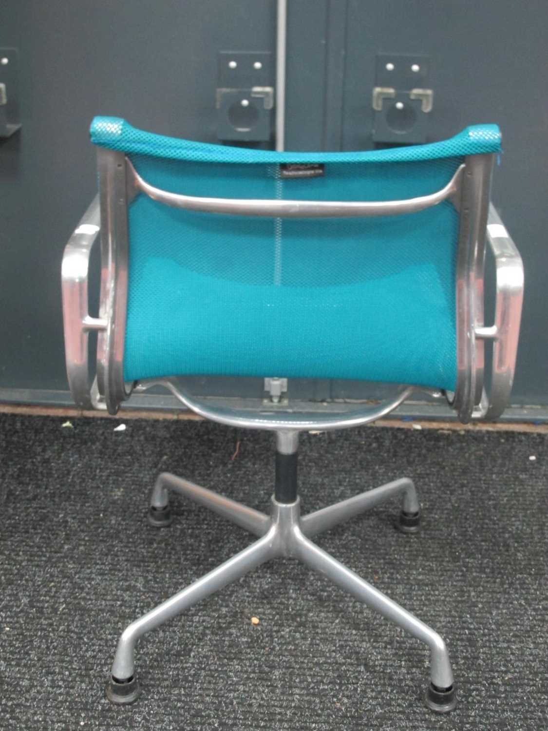 Charles Eames EA 107 Aluminium Side Chair, upholstered in a turquoise mesh fabric, black label to - Image 2 of 7