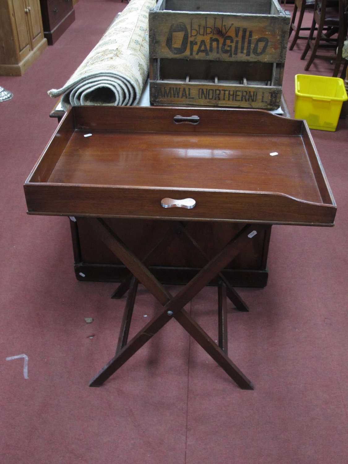 Early XX Century Mahogany Butlers Tray on Stand, with a tray top, pierced carrying handles on an X