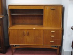1970's Teak High Backed Sideboard, with lipped protruding handles to right side compartment, three