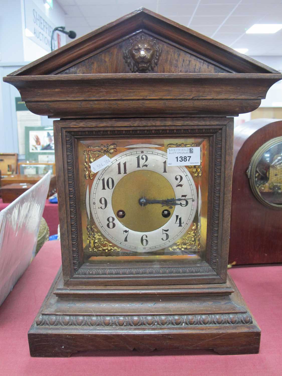 Junghans Mantle clock, with eight day movement, bevelled glass door.