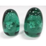 Two XIX Century Green Glass Dumps, of ovoid form each with vase of flowers, inner design the
