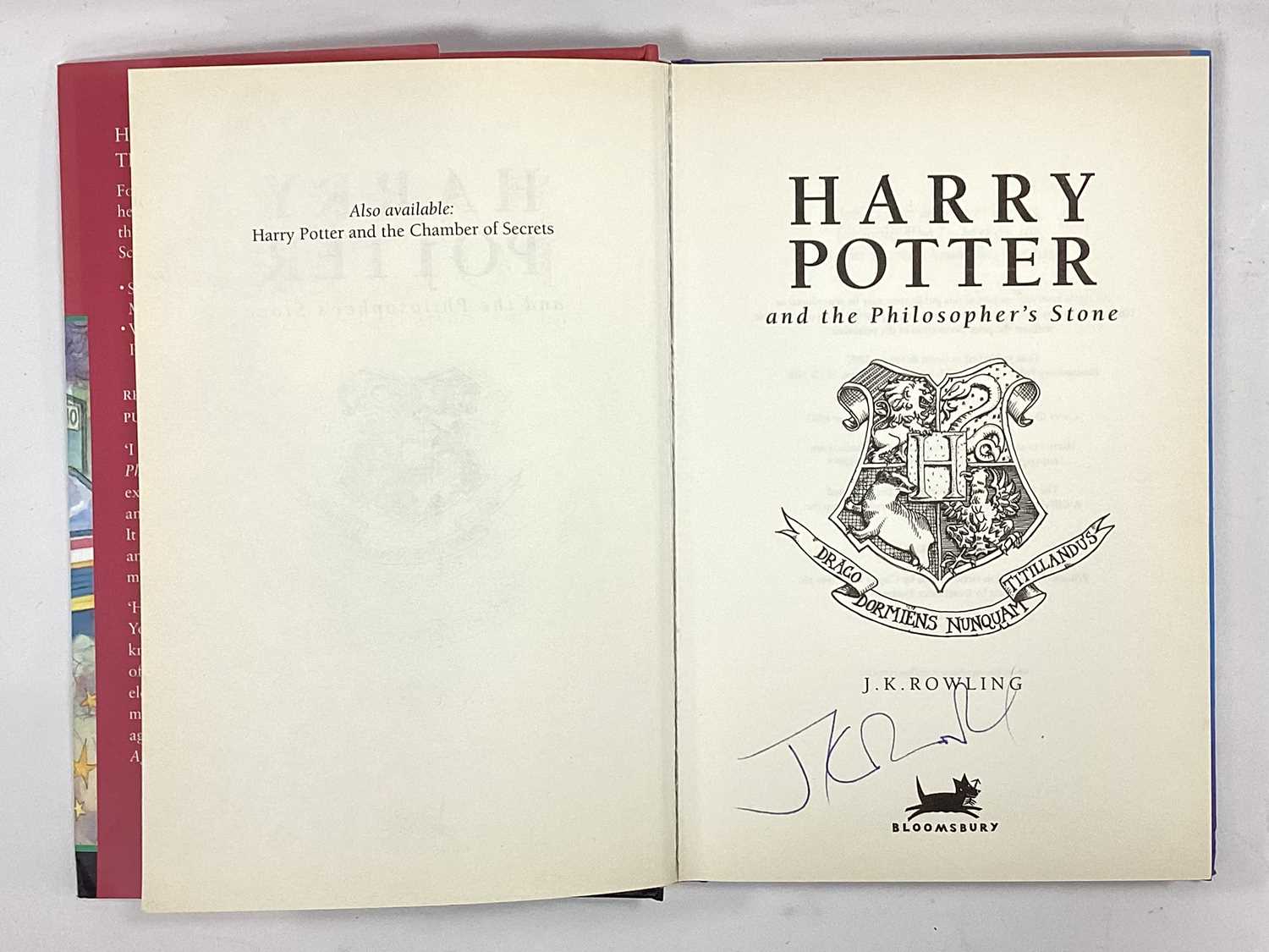 J.K. Rowling Autograph, blue pen signed (unverified) on an edition of The Philosopher's Stone,