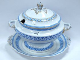 A large tureen on stand decorated in blue and white motif pattern and gilt, 'Kent' marked to base of