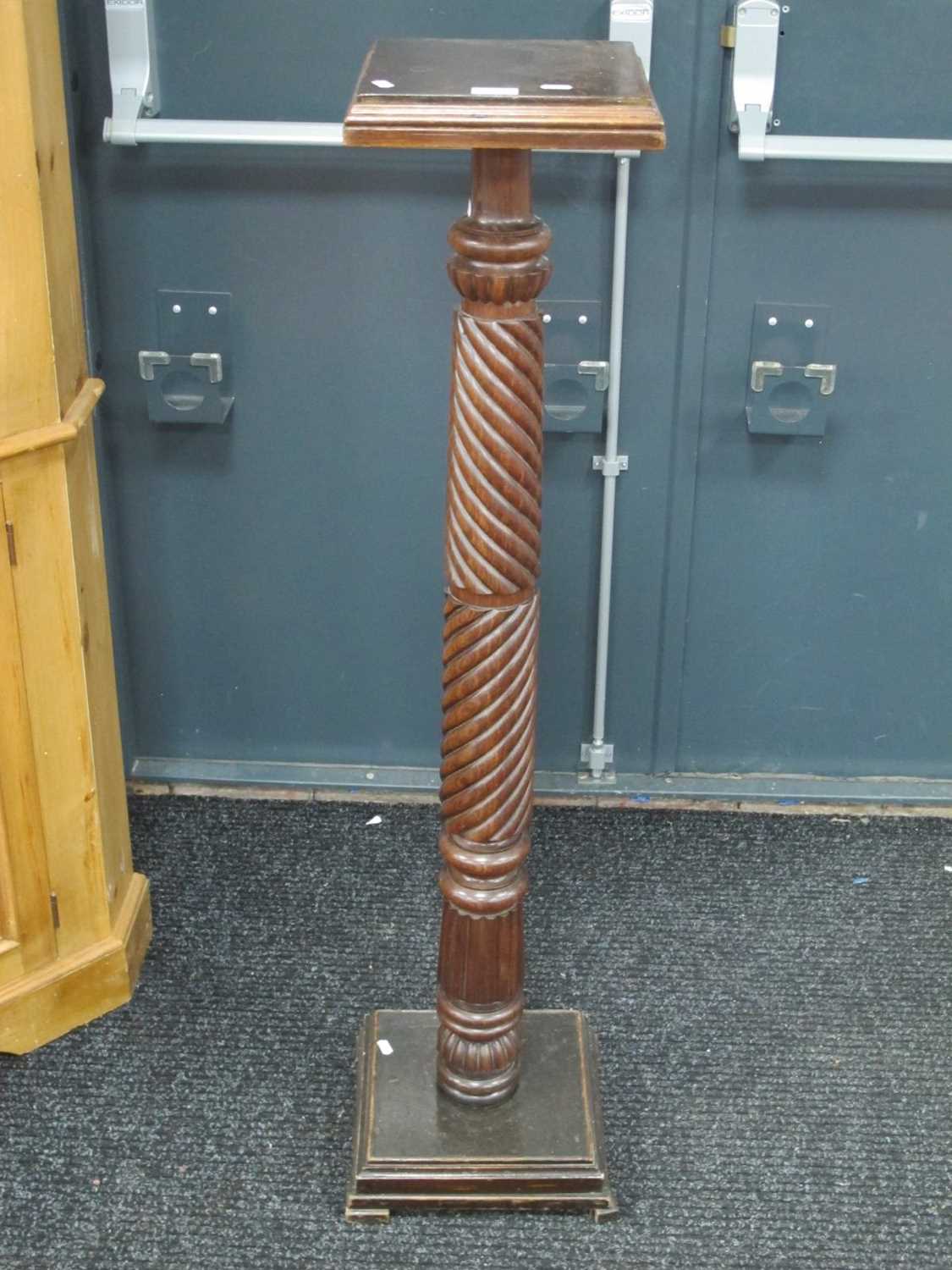 A XIX Century Mahogany Bed Post, converted to a jardiniere stand, with square top, turned pedestal