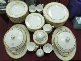 A Versailles France Porcelain Dinner Service, decorated with gilt trellis borders with scrolling
