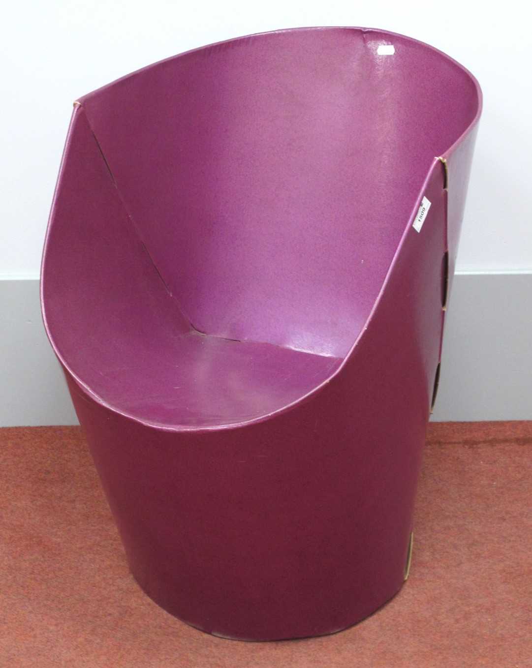 A purple flatpack bucket chair in the style of `Tab` chairs designed by David Bartlett, approx