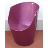 A purple flatpack bucket chair in the style of `Tab` chairs designed by David Bartlett, approx